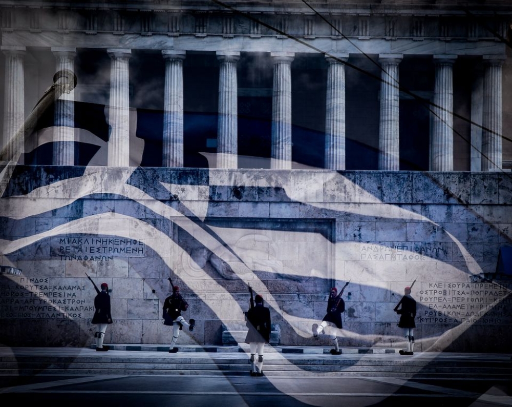 &Delta;&iota;&pi;&lambda;ή &epsilon;&omicron;&rho;&tau;ή &gamma;&iota;&alpha; &tau;&omicron;&nu; &alpha;&pi;&alpha;&nu;&tau;&alpha;&chi;&omicron;ύ &Epsilon;&lambda;&lambda;&eta;&nu;&iota;&sigma;&mu;ό &eta; 25&eta; &Mu;&alpha;&rho;&tau;ί&omicron;&upsilon;